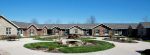 Assisted Living walking path landscaped garden courtyard
